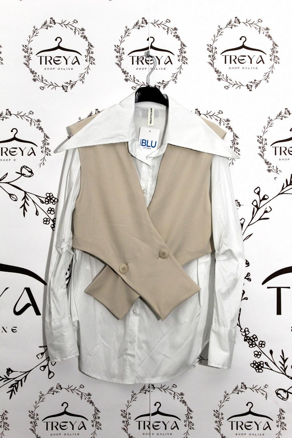 Camicia bianca con gilet sovrapposto